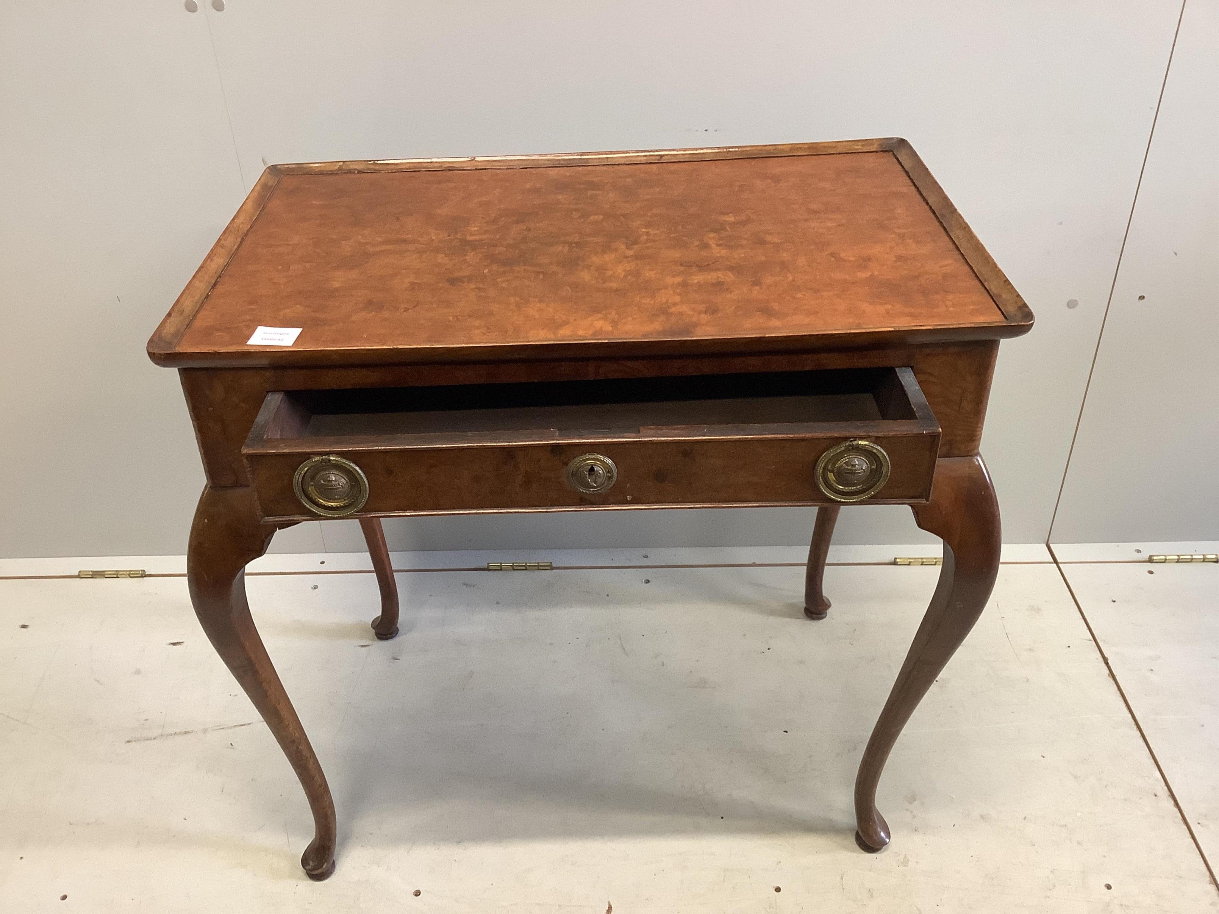 An 18th century and later walnut tray topped side table, fitted with a drawer, on cabriole legs, width 79cm, depth 48cm, height 74cm. Condition - fair